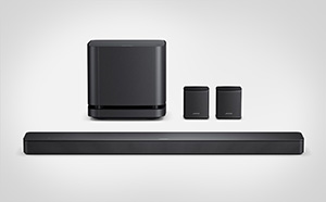 Barre de son Bose noire, avec caisson et enceintes surround sans fil